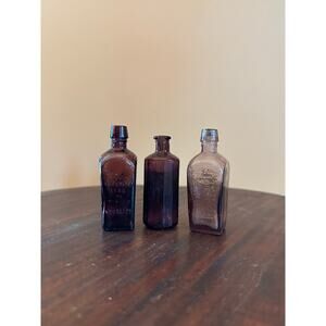 3 Purple Vintage Miniature Elixir and Medicine Bottles